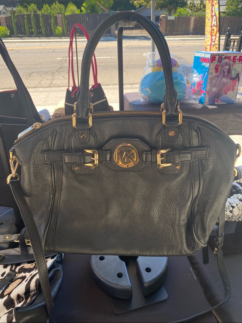 Michael Kors Black Leather Satchel with Gold Accents